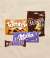 Ein Bild mit einem Snickers-Riegel, einer M&M's Packung, einer Toffifee Packung und einer Milka Tafel.